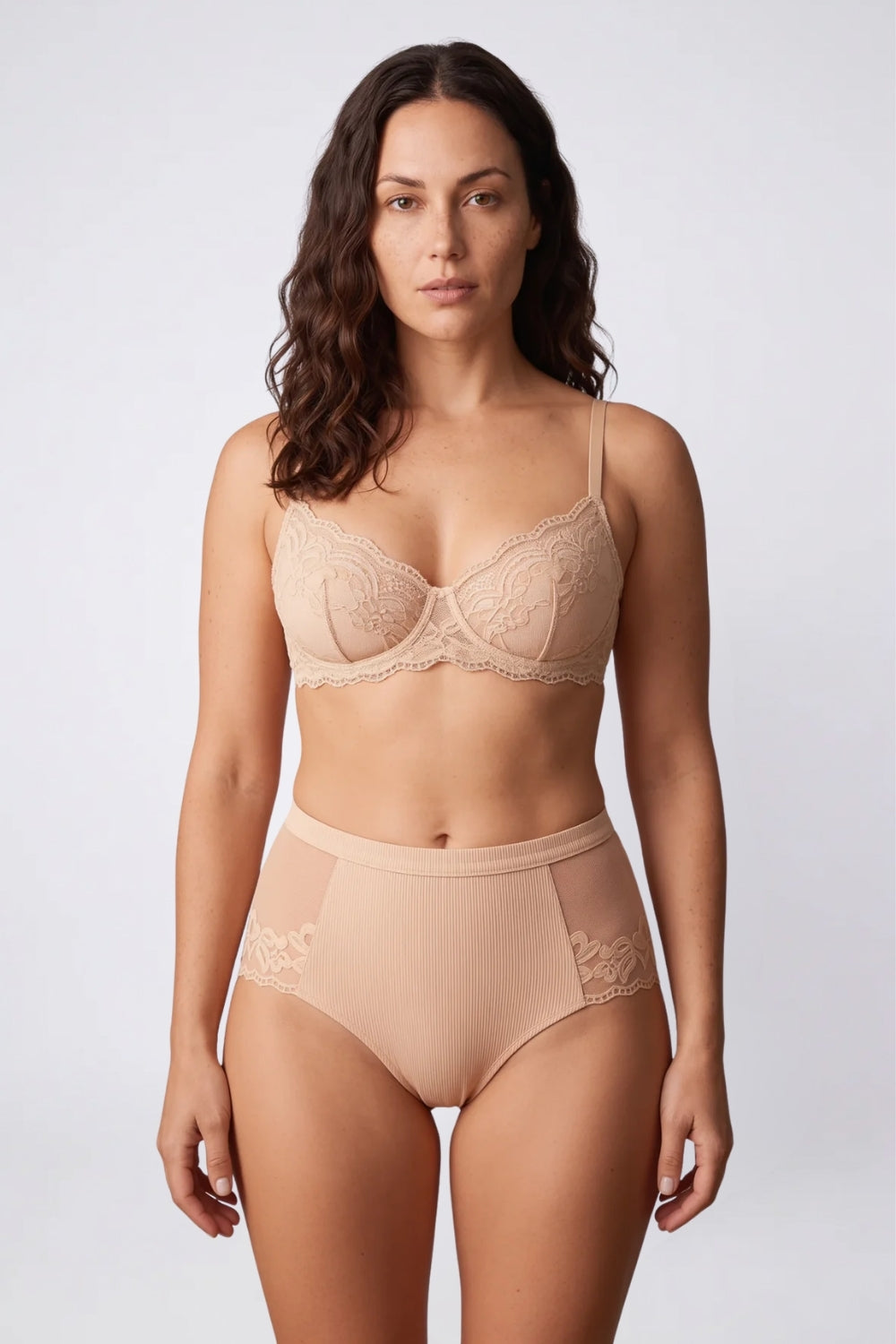 Model wearing floral lace mid-high rise brief in nude, alternate view#Color_Nude