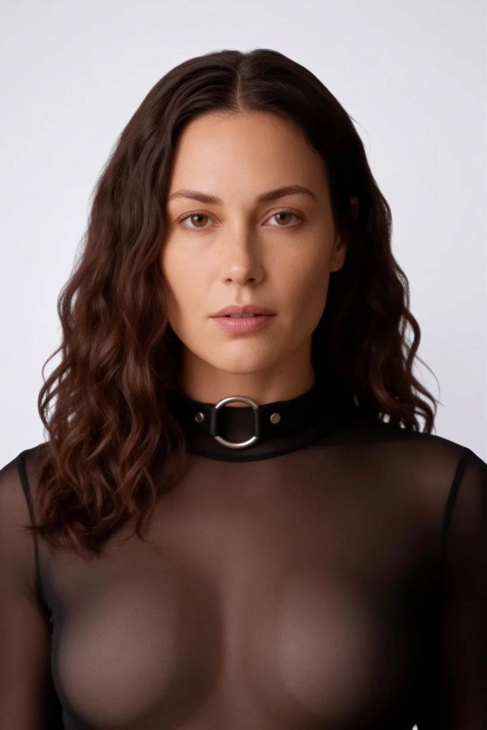 Model wearing minimalist grain finish with o-ring choker harness in black