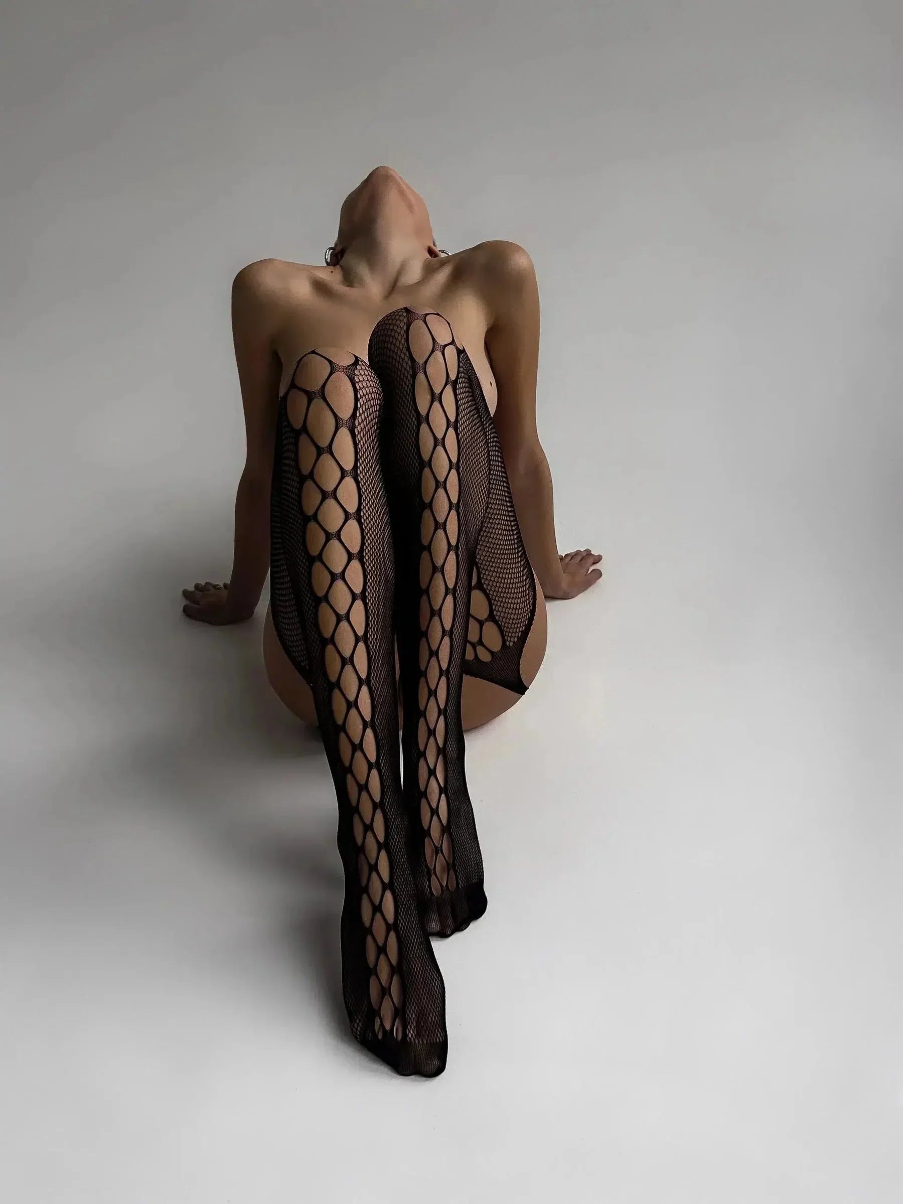 Fishnet garter illusion with side cutouts – Stockings