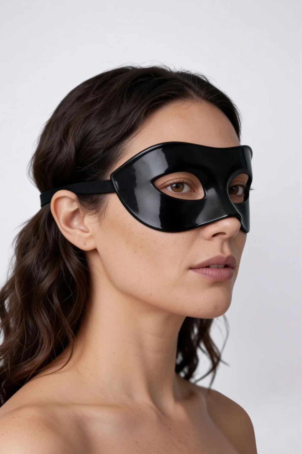 Model wearing frosted half-face eye mask in black, alternate view