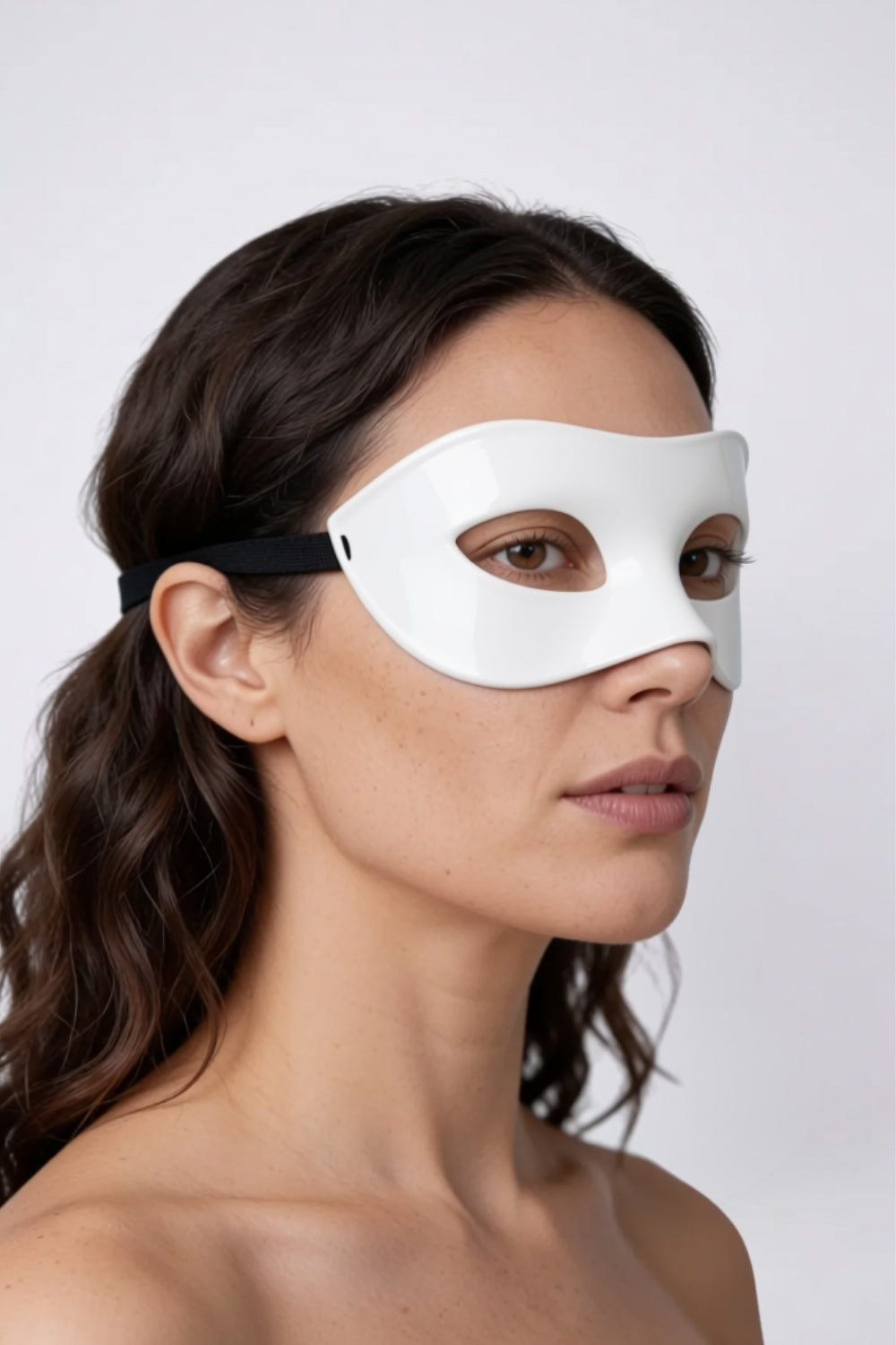 Model wearing frosted half-face eye mask in white, alternate view
