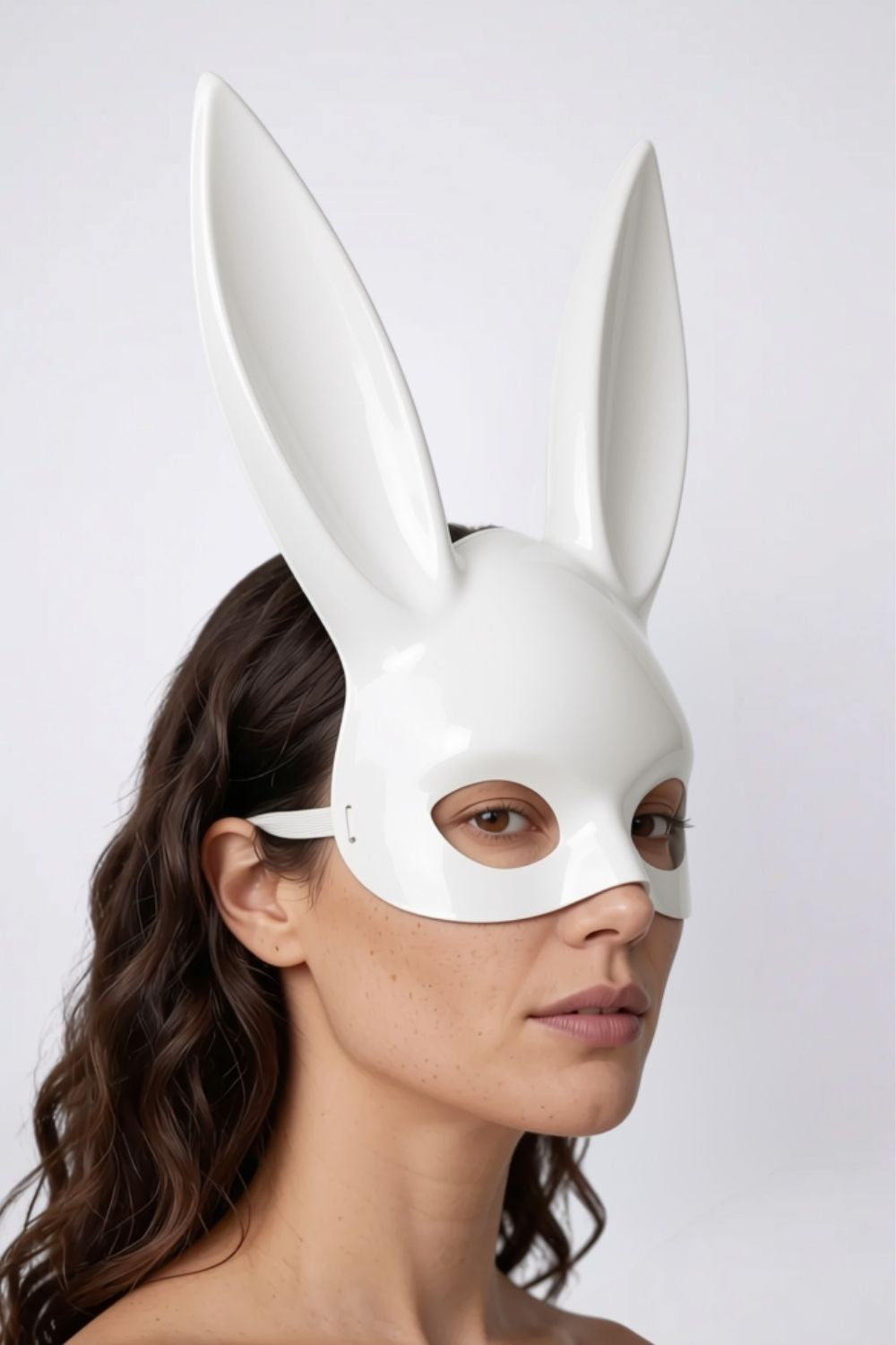 Model wearing long ear full-face costume mask in white, alternate view
