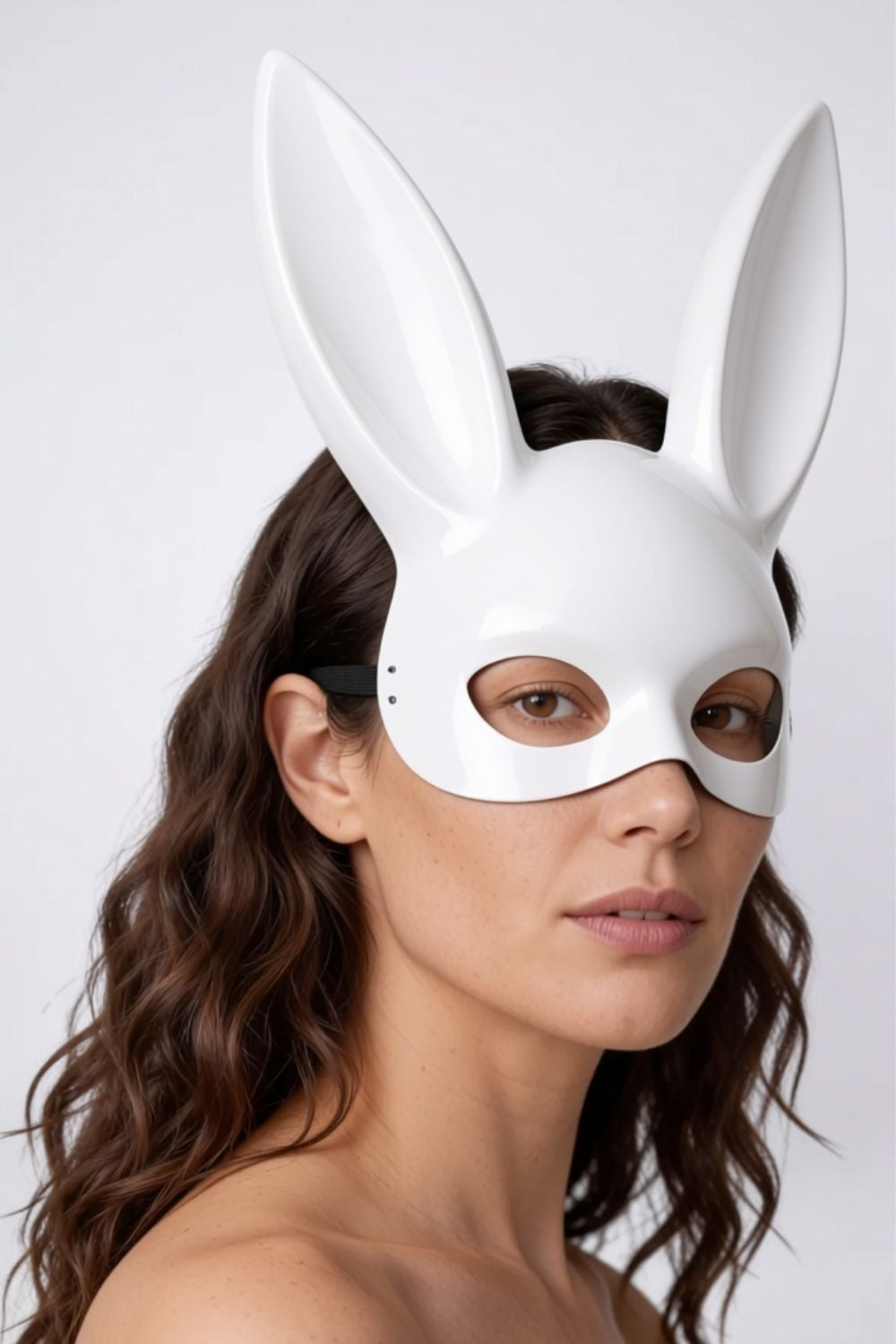 Model wearing long ear full-face costume mask in white, alternate view