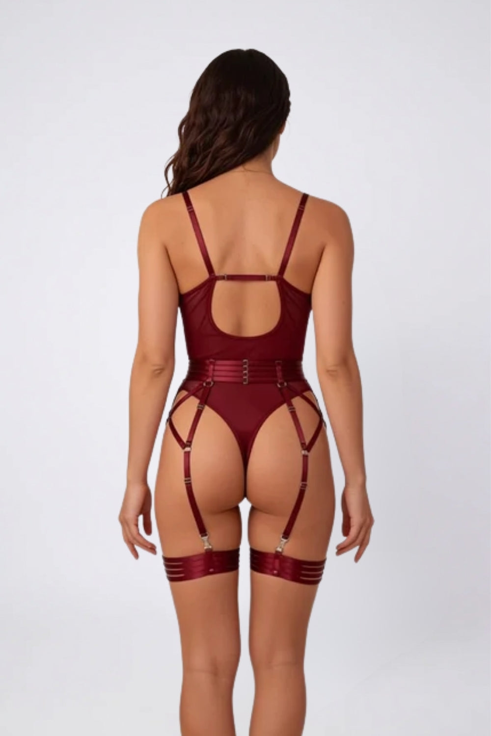 Model wearing sculpt allure bodysuit in burgundy, alternate view