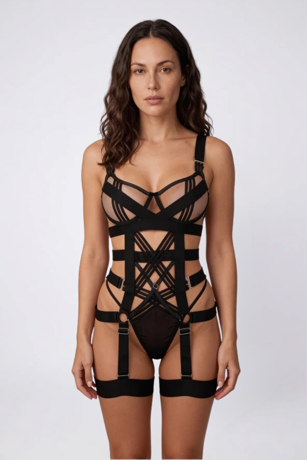 Model wearing strappy scarlet statement bodysuit in black