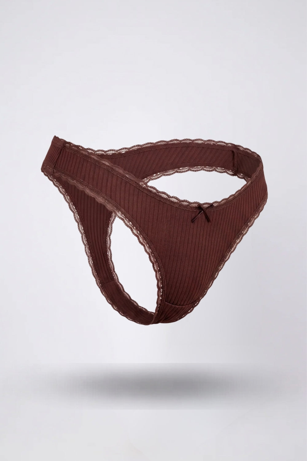 Model wearing ribbed lace trim thong in black, alternate view