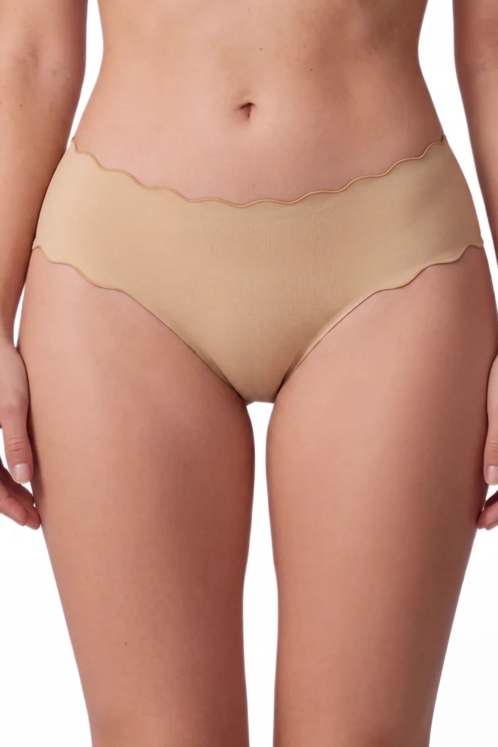 Model wearing wavy edge seamless brief in sand