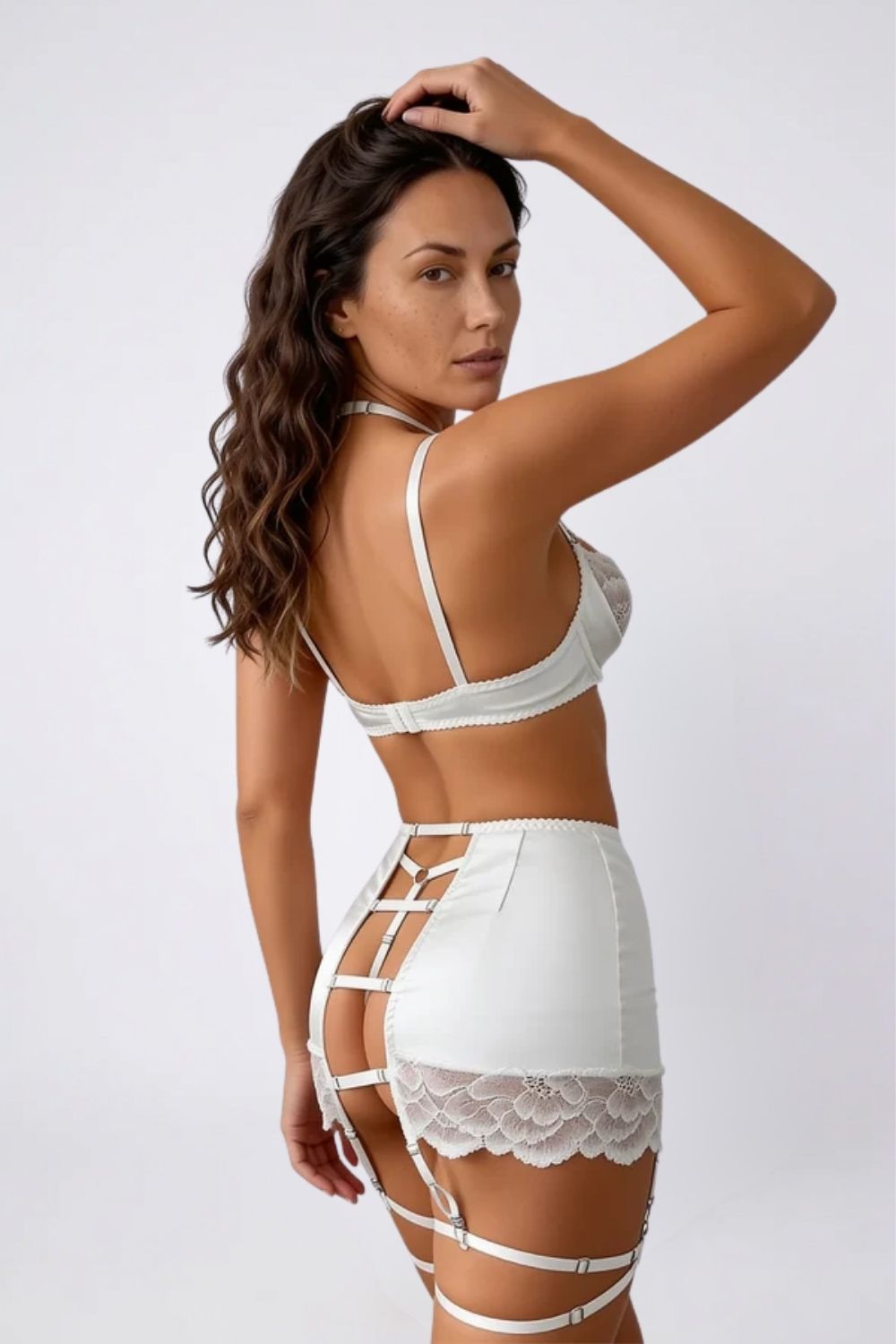 Model wearing satin lace garter three-piece lingerie set in white, alternate view