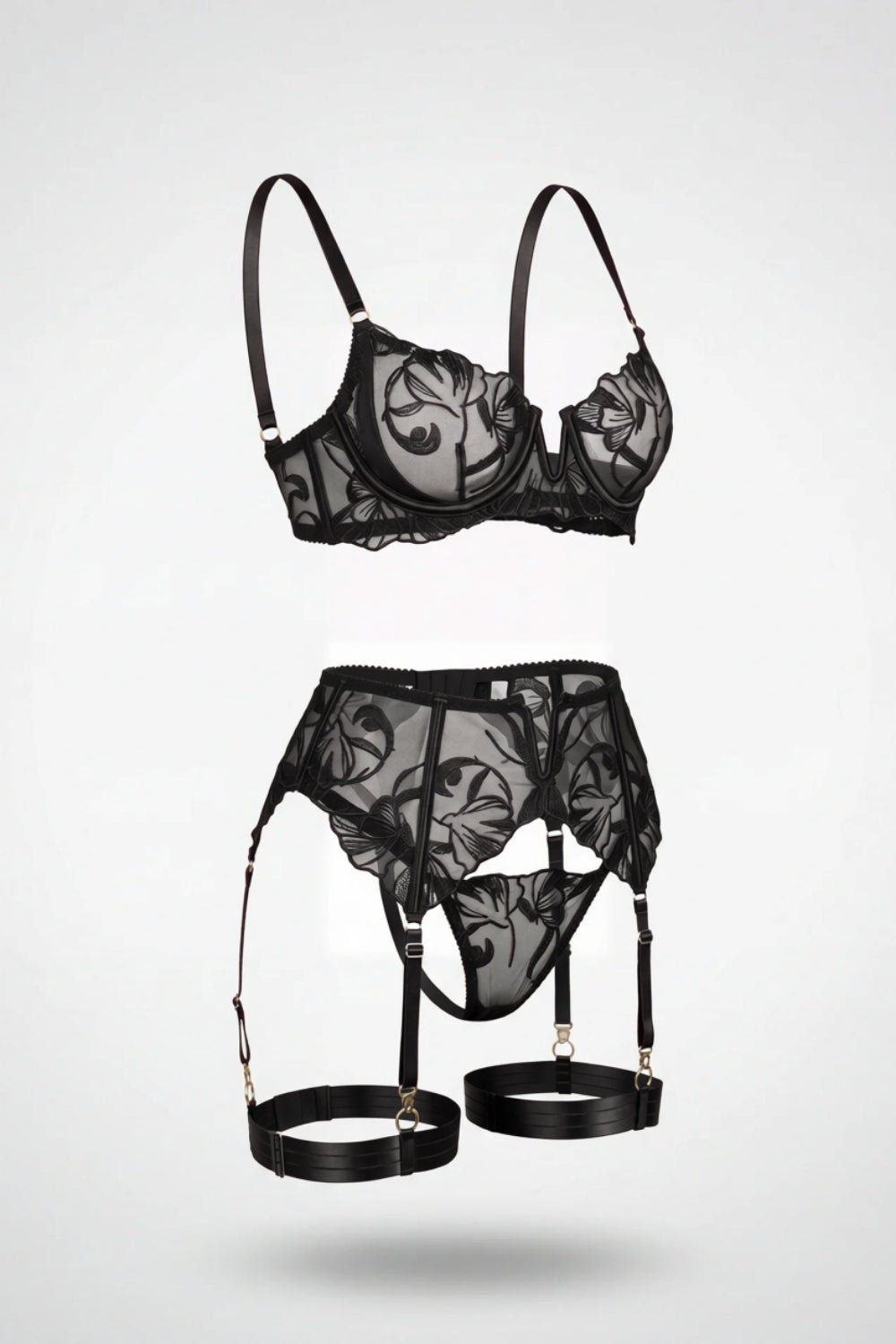 Sheer embroidered lace four-piece lingerie set in black