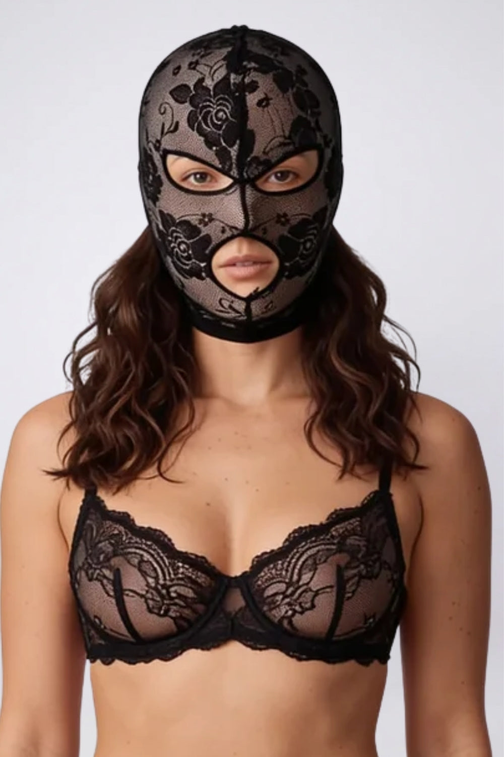 Model wearing floral lace cutout head stocking in black