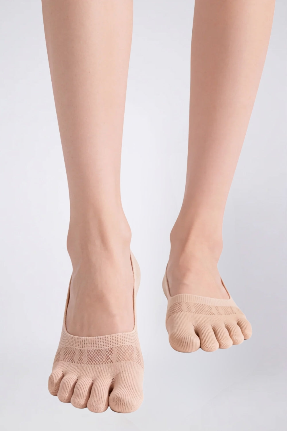 Model wearing lyocell five-toe no-show stockings in nude