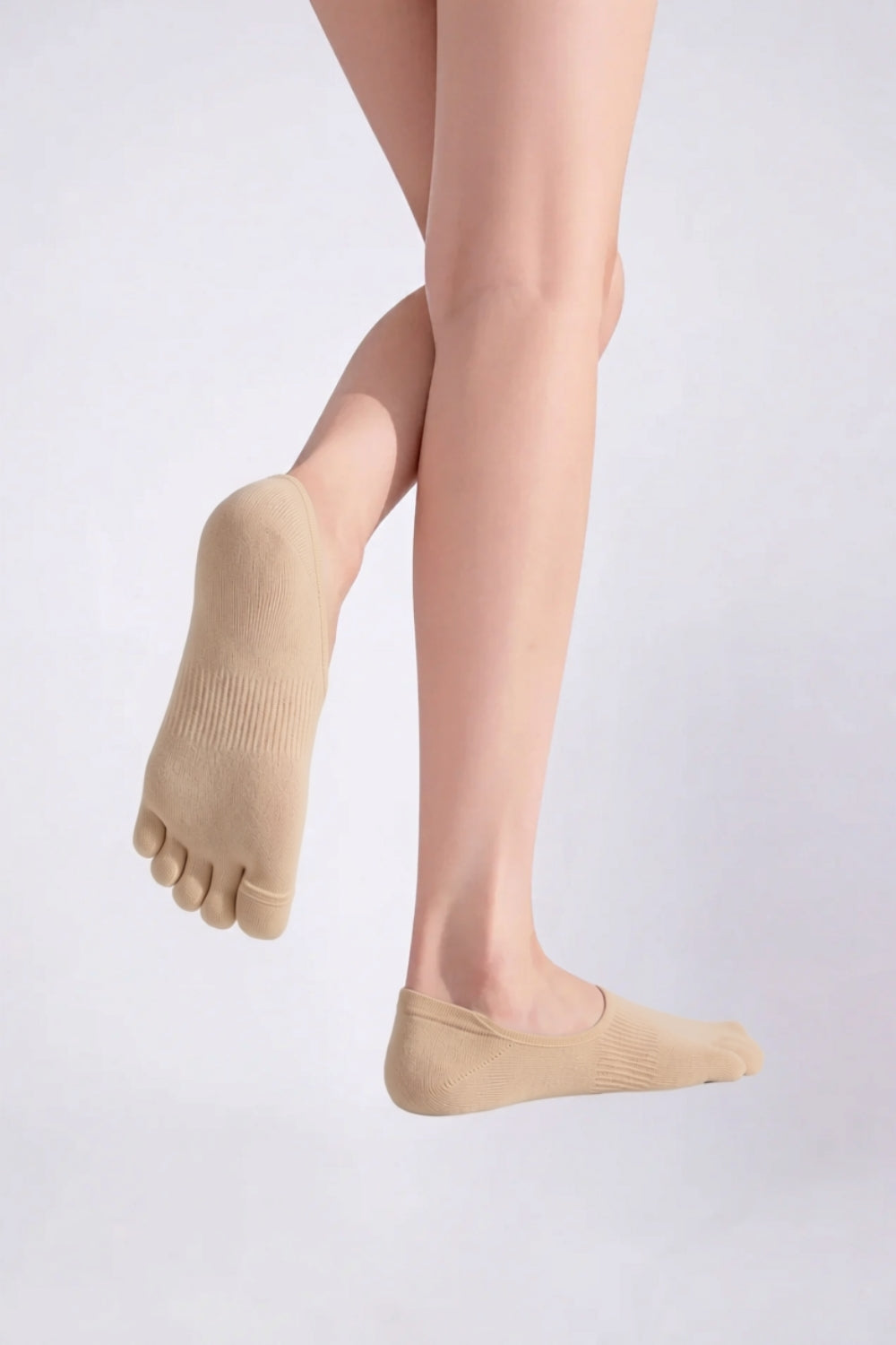 Model wearing lyocell five-toe no-show stockings in nude, alternate view