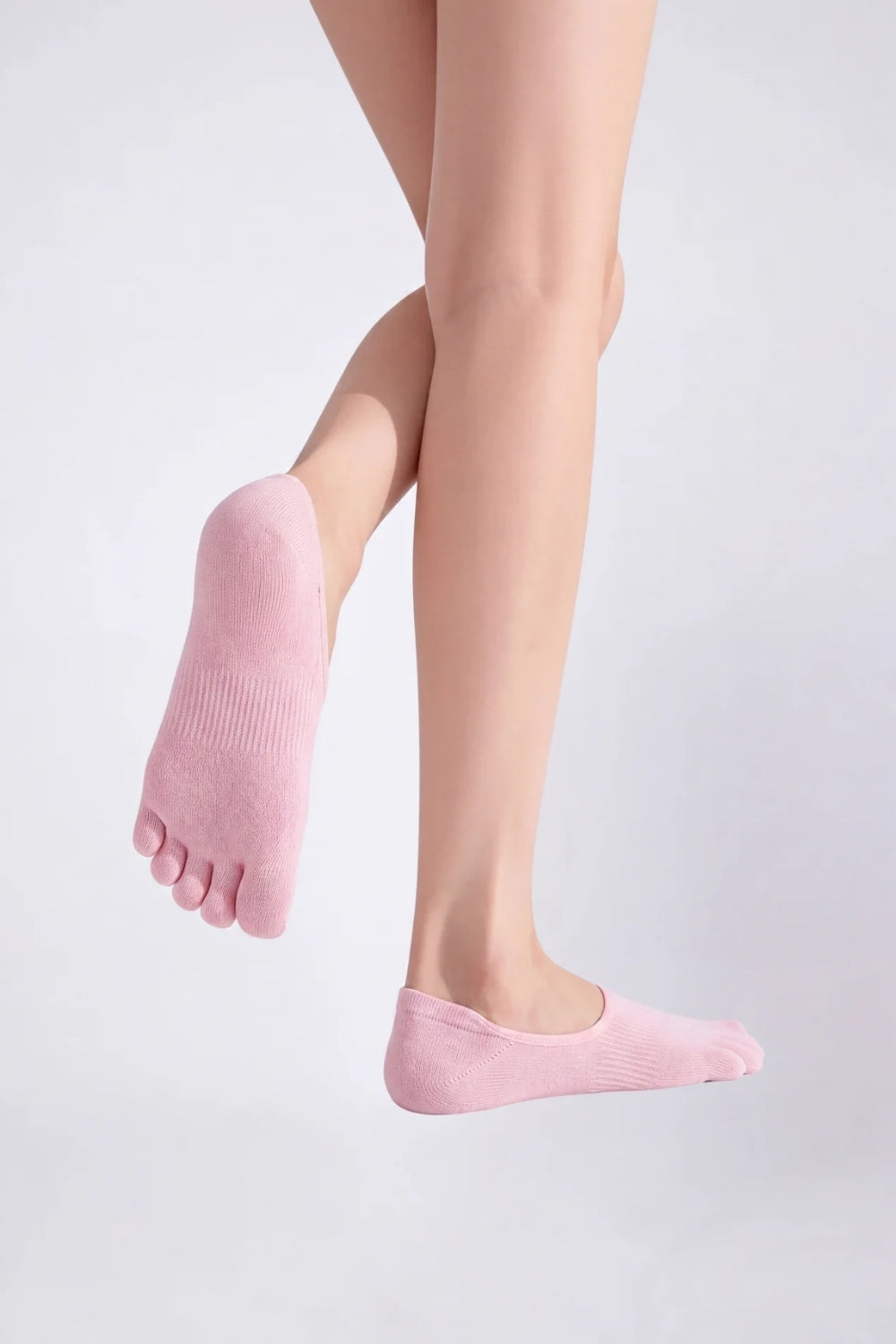 Model wearing lyocell five-toe no-show stockings in pink, alternate view