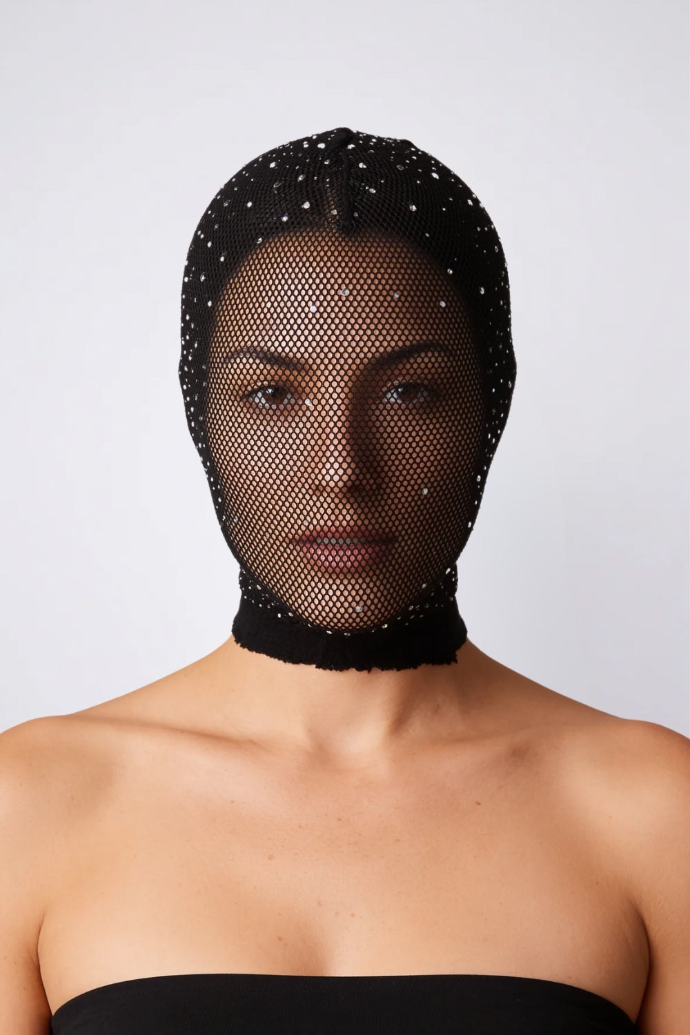Model wearing sheer embellished mesh head stocking in black