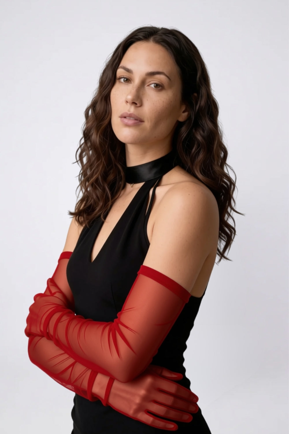 Model wearing sheer mesh long sleeve gloves arm stockings in red, alternate view