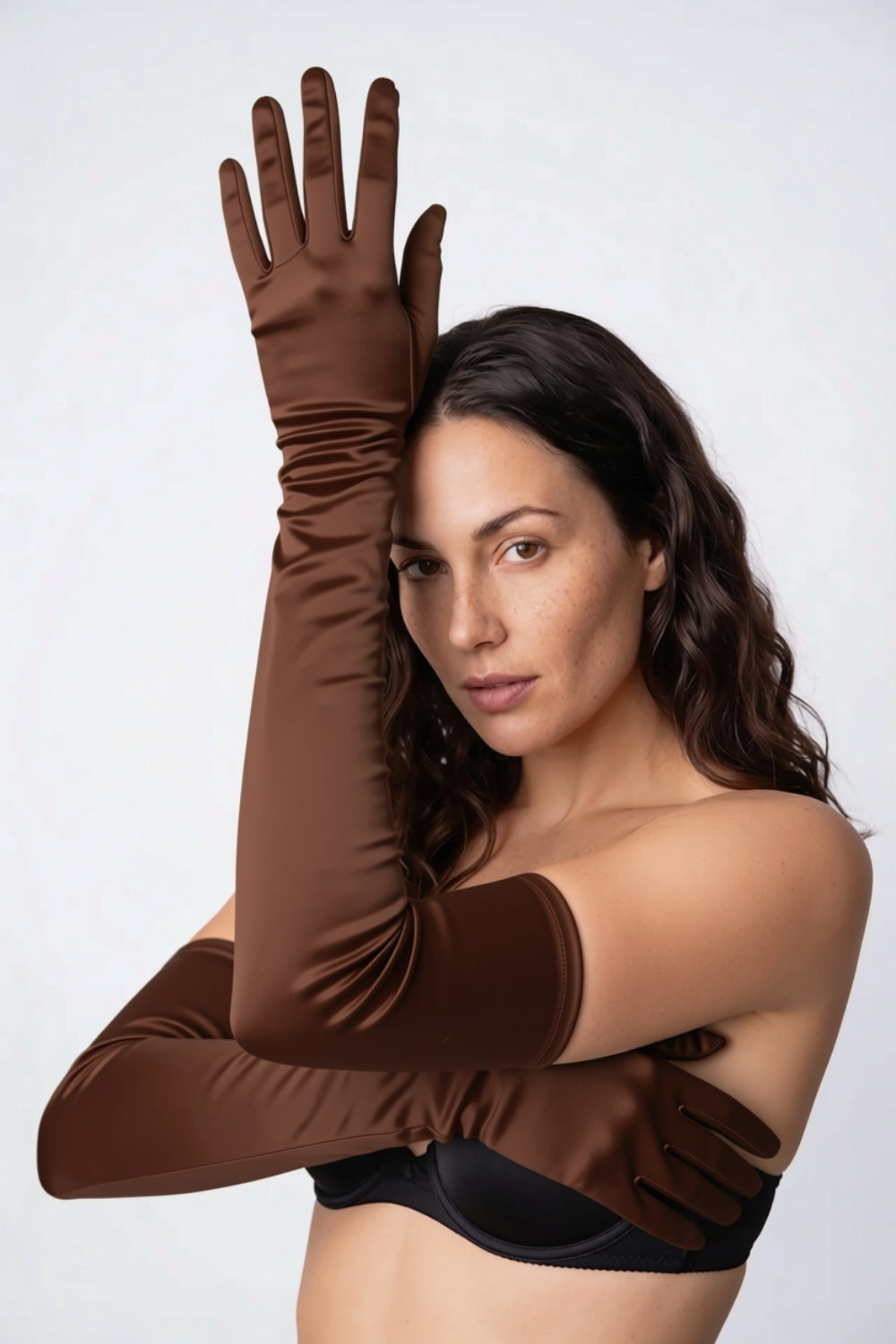 Model wearing silky opera length gloves in brown, alternate view