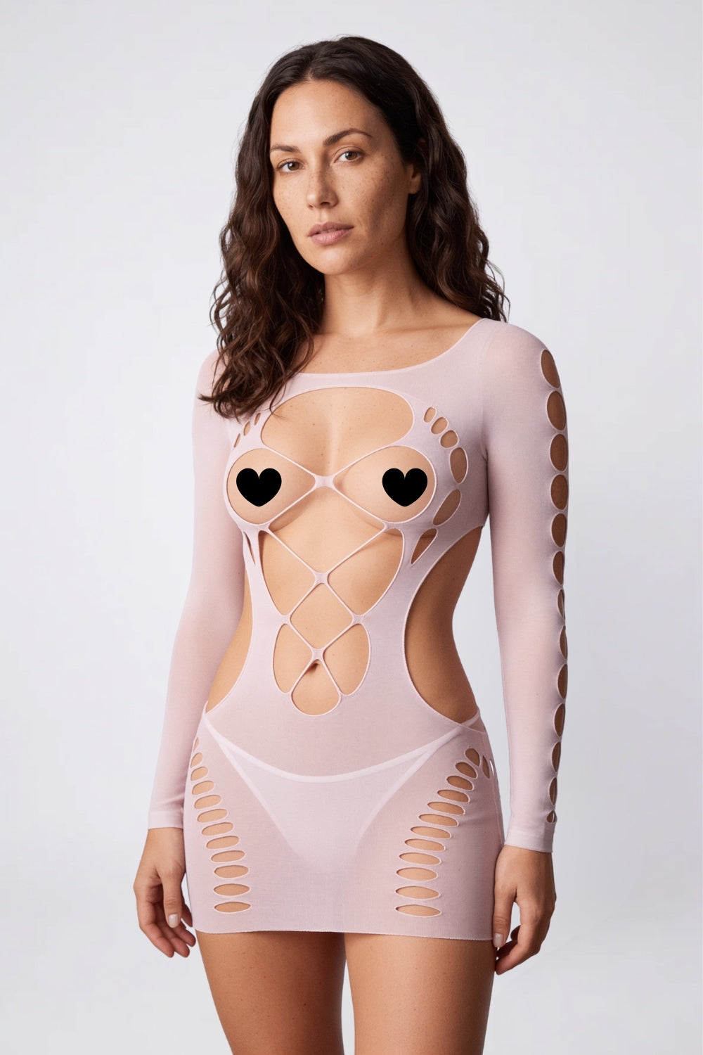 Model wearing strappy cutout detail bodystocking in white