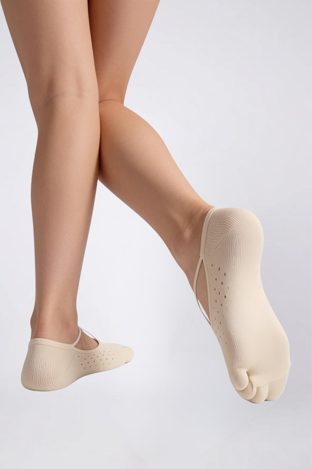 Model wearing strappy five-toe no-show stockings in nude, alternate view