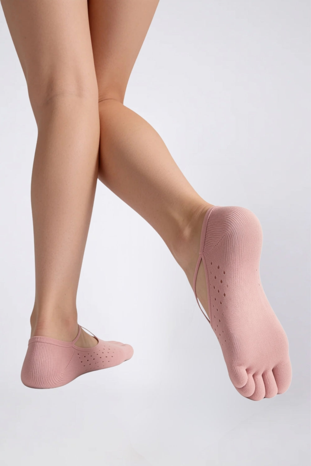 Model wearing strappy five-toe no-show stockings in pink, alternate view