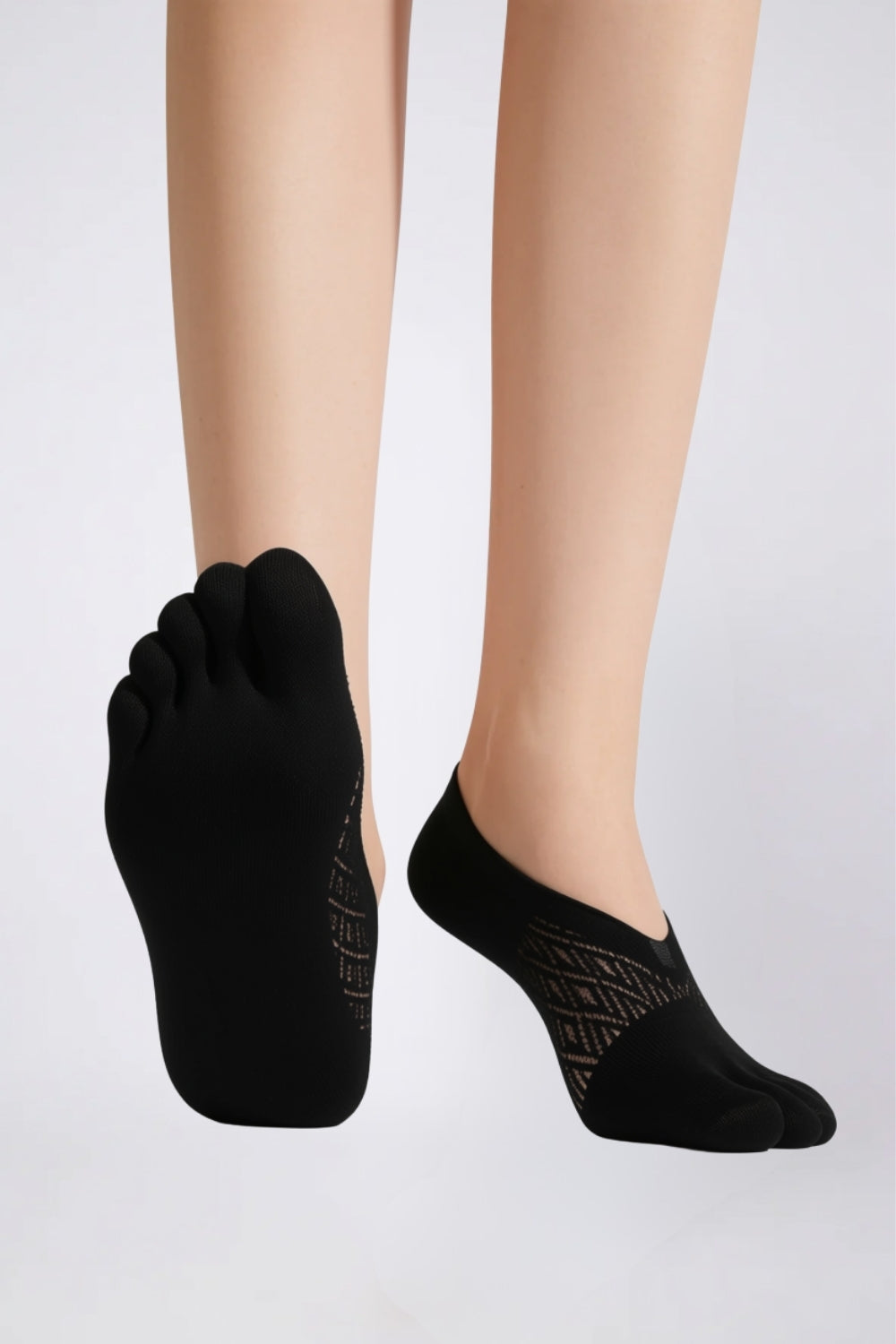 Model wearing toe design no-show stockings in black, alternate view