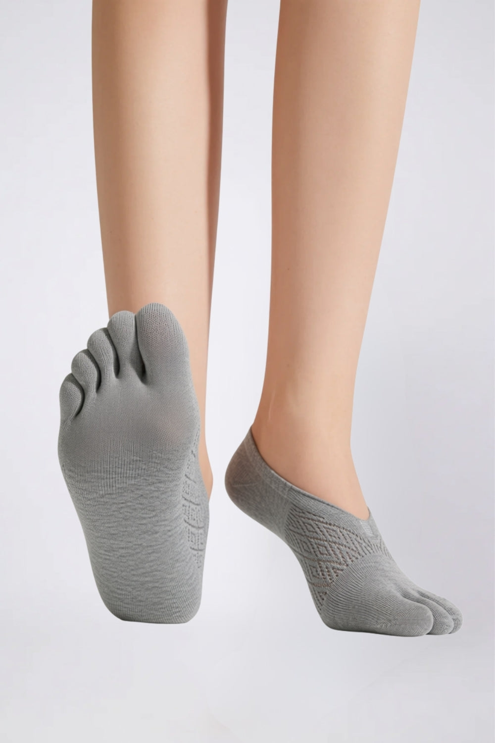 Model wearing toe design no-show stockings in grey, alternate view