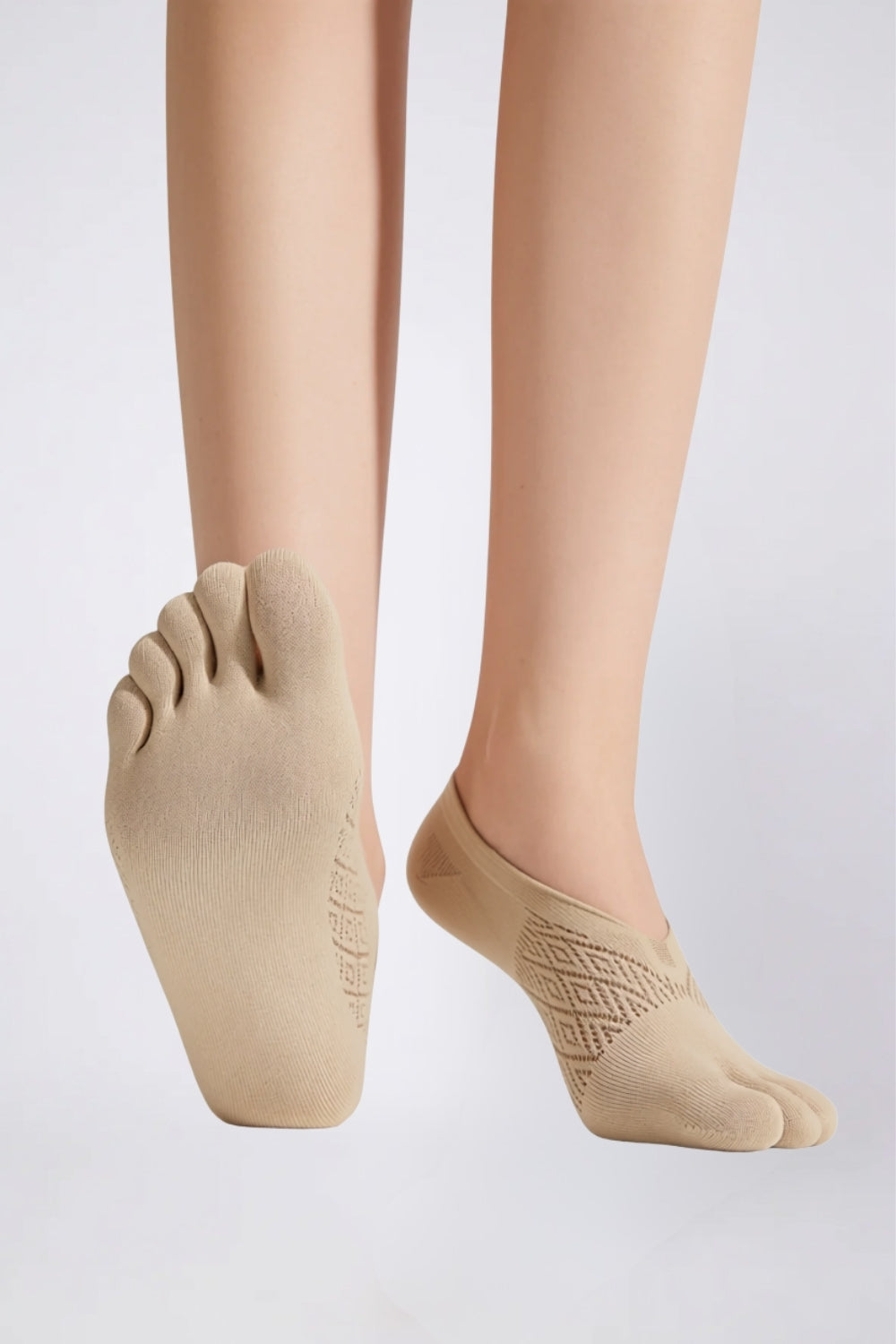 Model wearing toe design no-show stockings in nude, alternate view